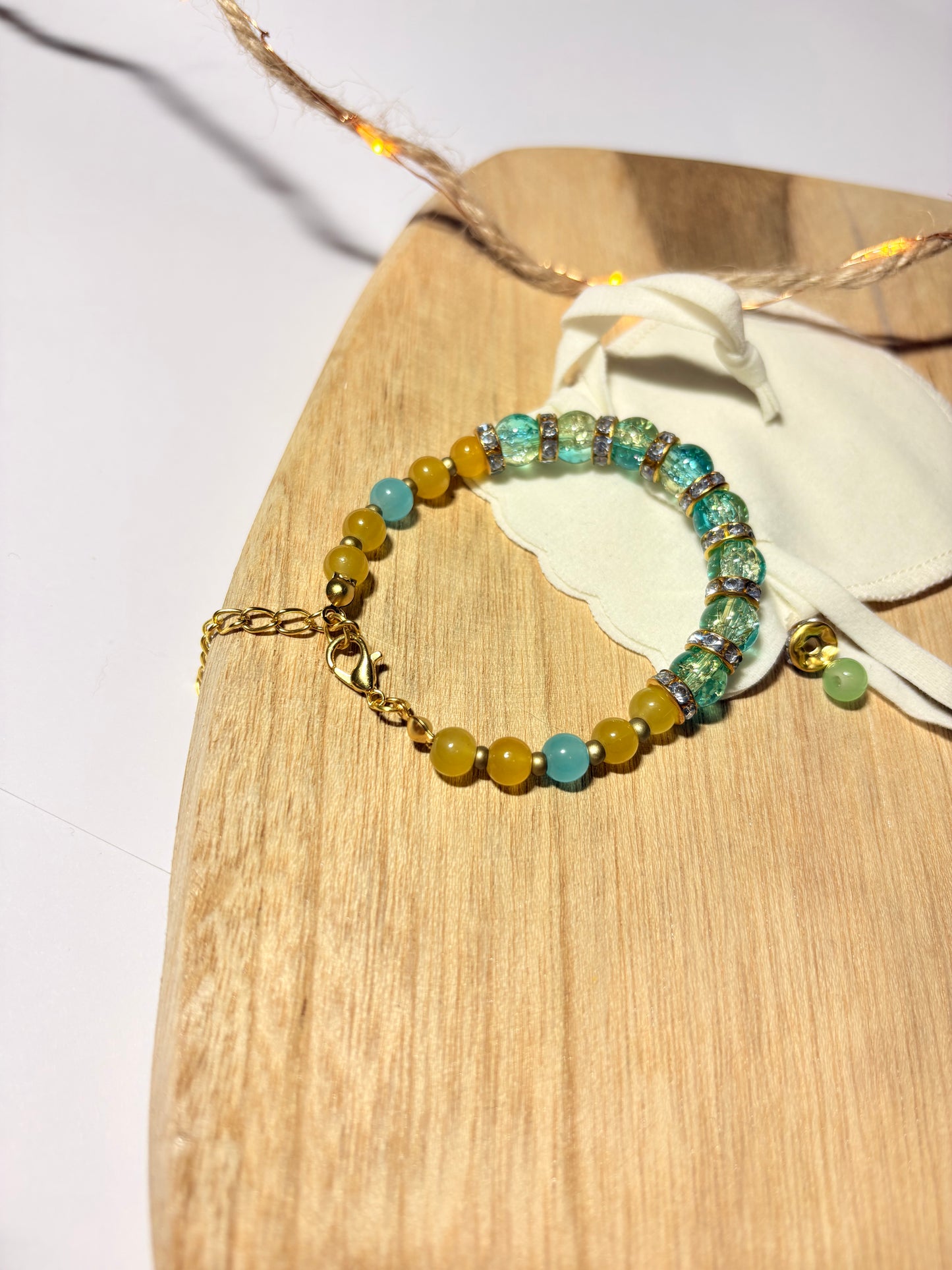 beaded/gold charm bracelet