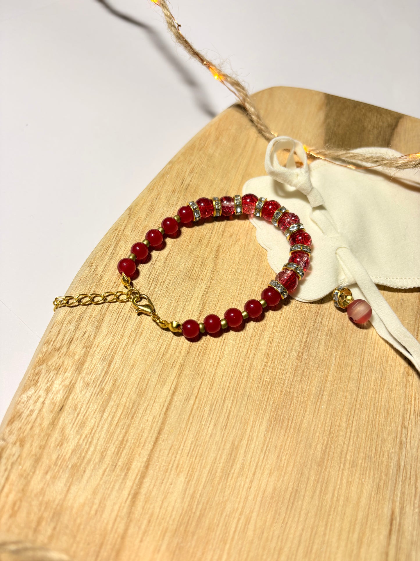 beaded/gold charm bracelet